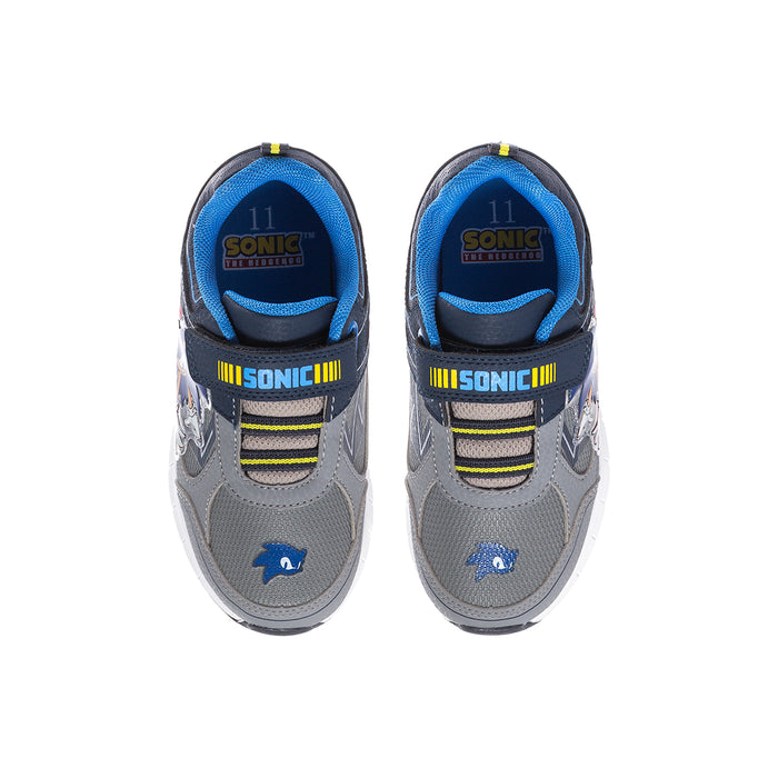 Pair of kids' light-up sneakers with blue tongue lining, SONIC logo and LED side stripes