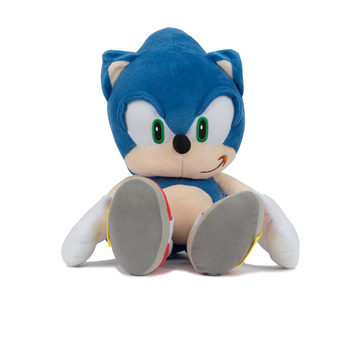 Blue plush character backpack with face patch and stuffed body, seated front view
