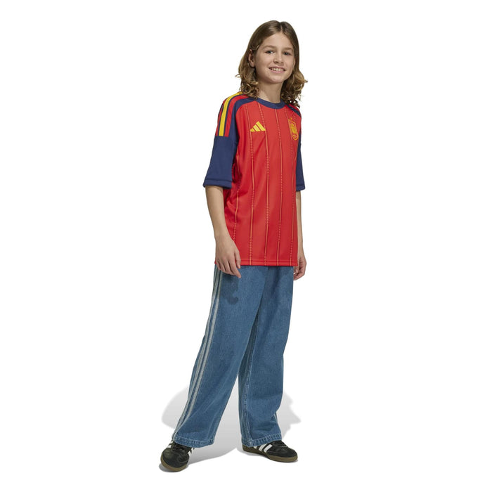Youth football jersey, red top with navy sleeves and long striped panel stitching