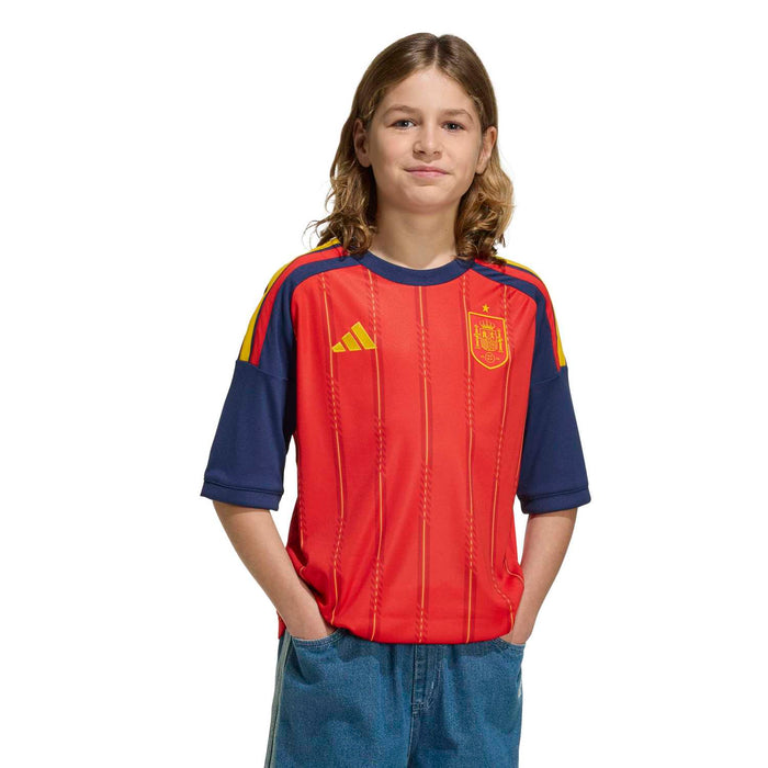 Youth football jersey red with navy cuffs, yellow chevrons and Spain crest