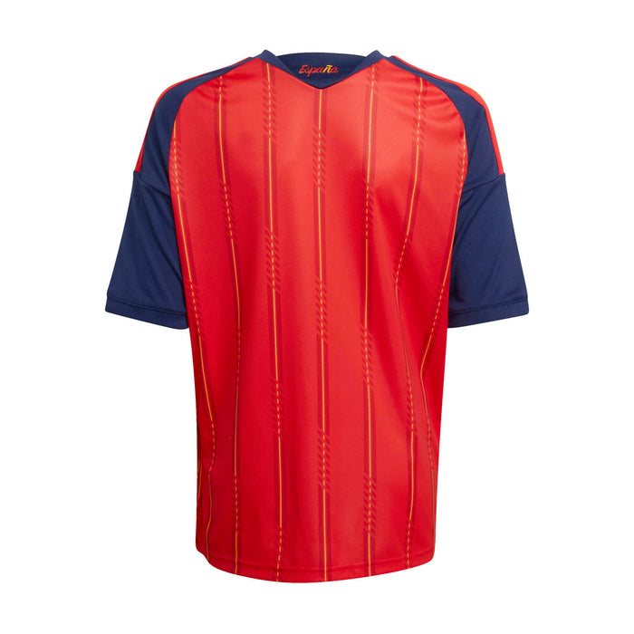 Youth football jersey back view, red body with navy sleeves and vertical stitch lines
