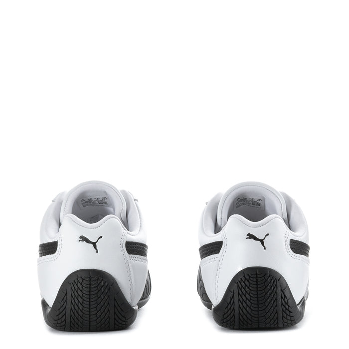 Women's white leather sneakers heel view with Puma logo and black rubber tread