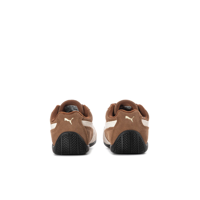 Kids brown lace-up sneakers from the heel, black textured sole and Puma logo