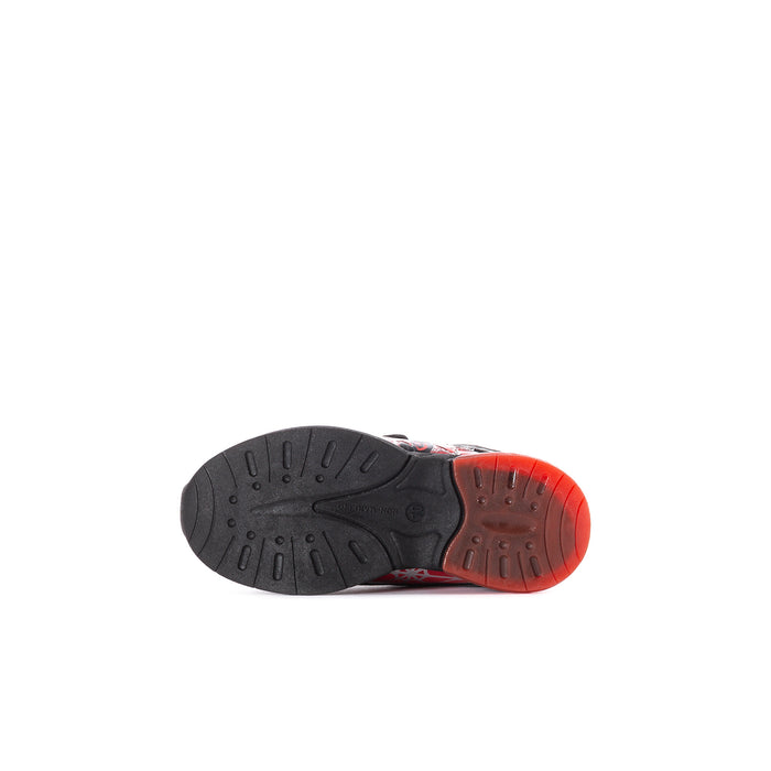 Toddler sneaker outsole with black traction tread and reddish rubber heel