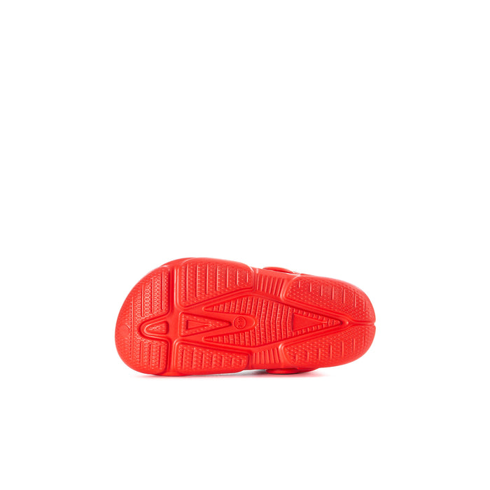 Toddler red clog outsole with textured tread and traction pattern