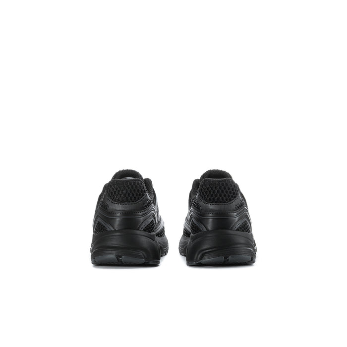 Kids black sneakers back view with heel tab and molded sole