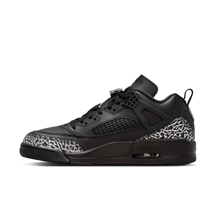 Men's black low-top sneaker with hook-and-loop strap, leopard-print side panel