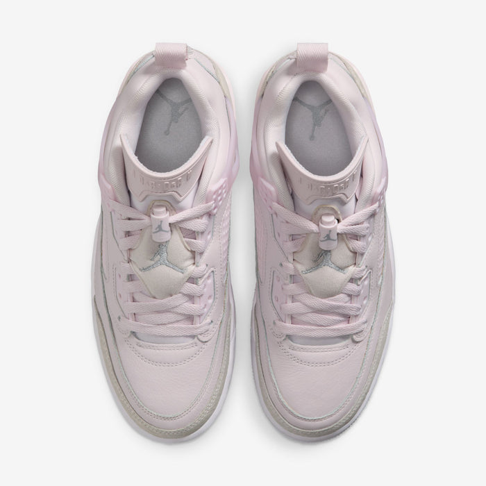 Pair of women’s pearl pink low-top sneakers, viewed from above with lace-up tops