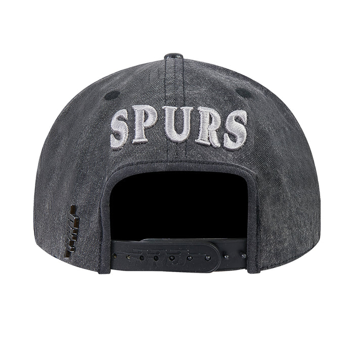 Washed black/gray snapback cap with SPURS text on front and adjustable back strap
