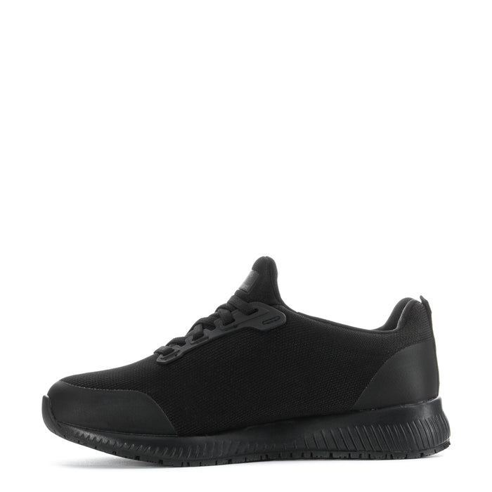Women’s black athletic sneaker three-quarter side view with rubber toe and sole