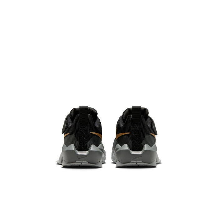 Kids black and gray sneakers rear view with Velcro strap and cushioned heel