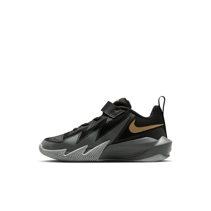 Kids black, gray and gold low-top sneakers with swoosh and Velcro closure
