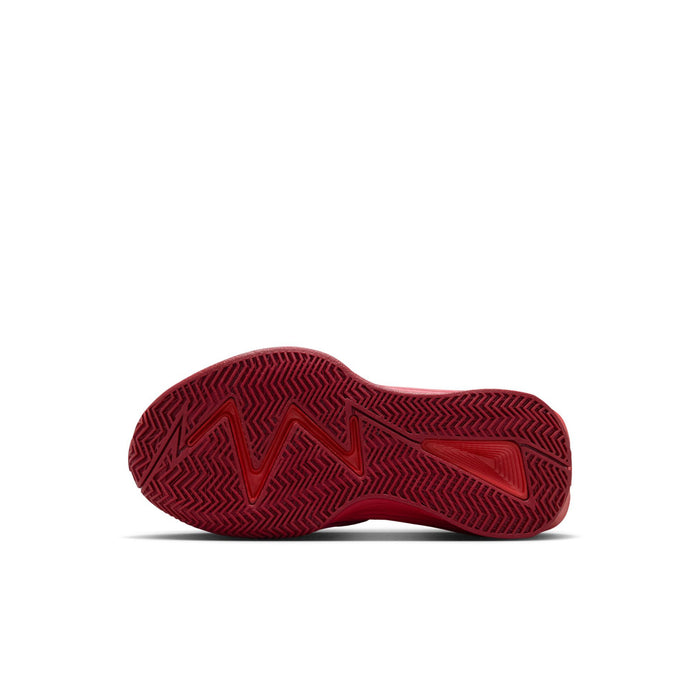 Kids red outsole on black and red sneakers with textured herringbone tread