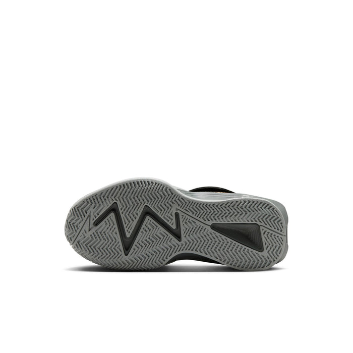Kids sneaker outsole with gray tread pattern and dark heel grip