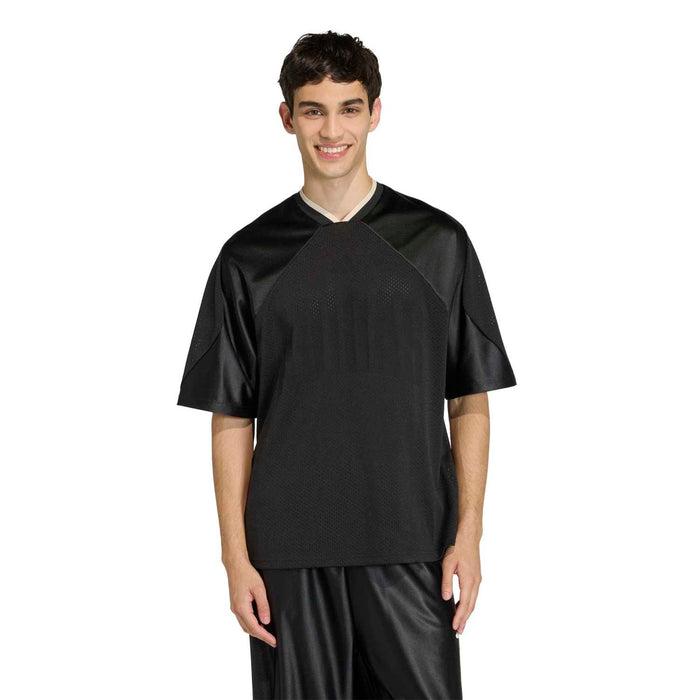 Black mesh stadium tee on model with V-neck collar and raglan short sleeves