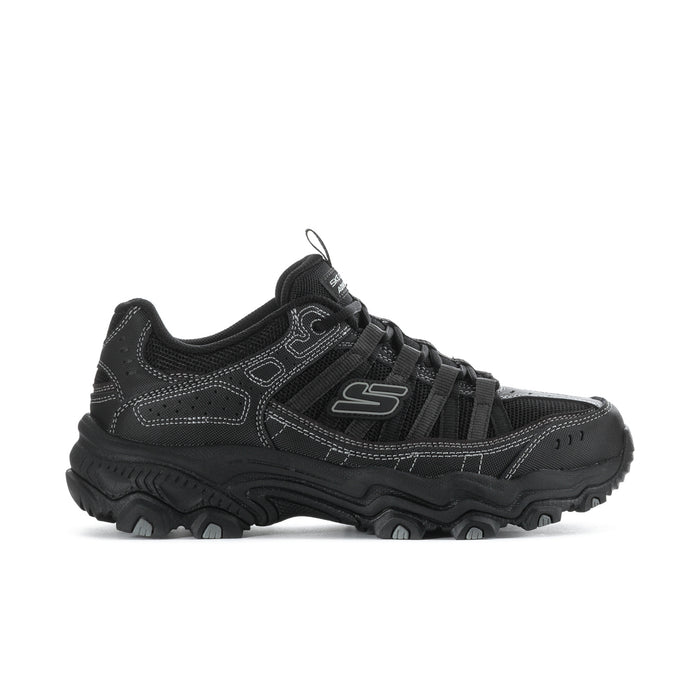 Men's black athletic sneakers with chunky trail sole and lace-up closure