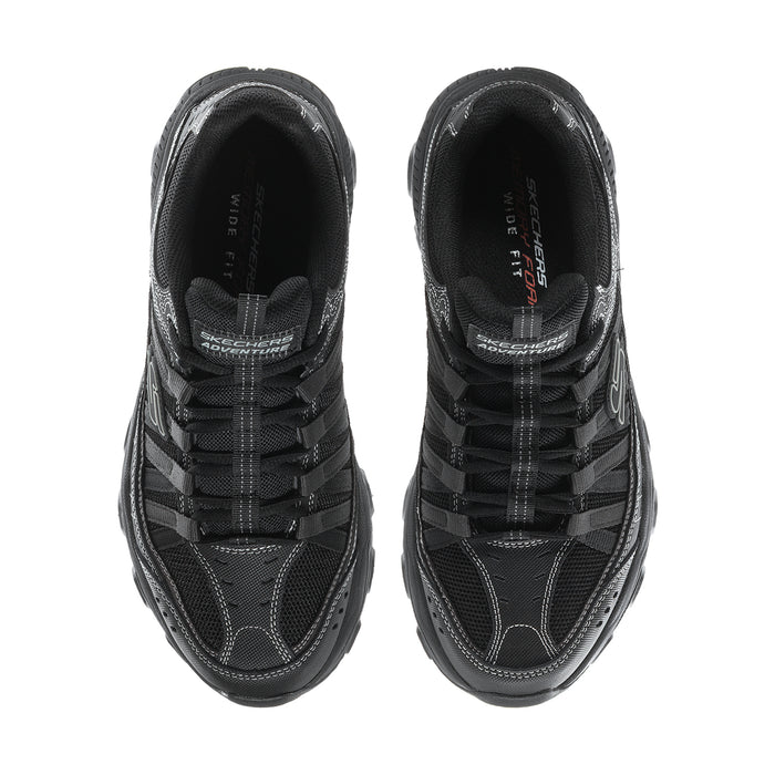 Men's black sneaker pair, top view showing laces and padded interior