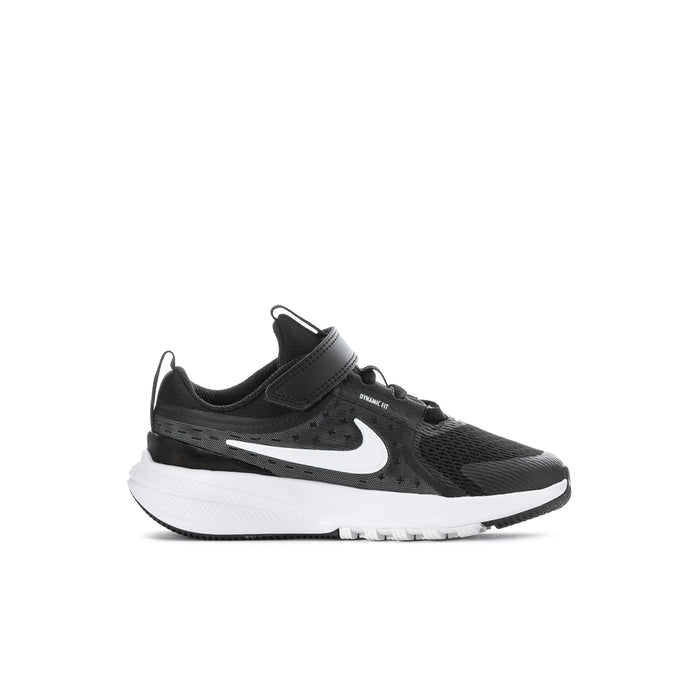 Kids black running sneakers with white Nike swoosh and cushioned white sole