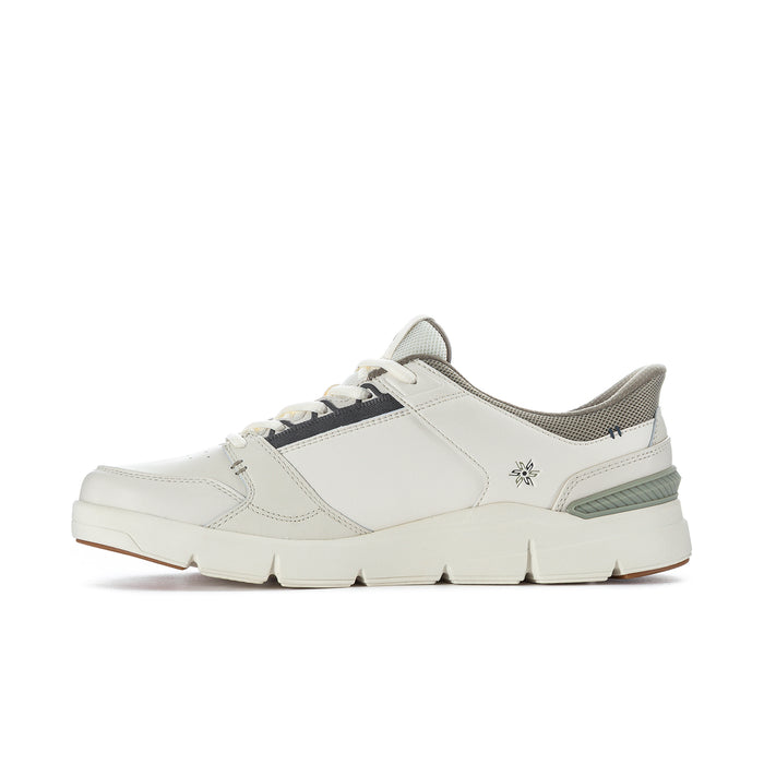 White low-top sneakers with green side stripe and small side logo detail