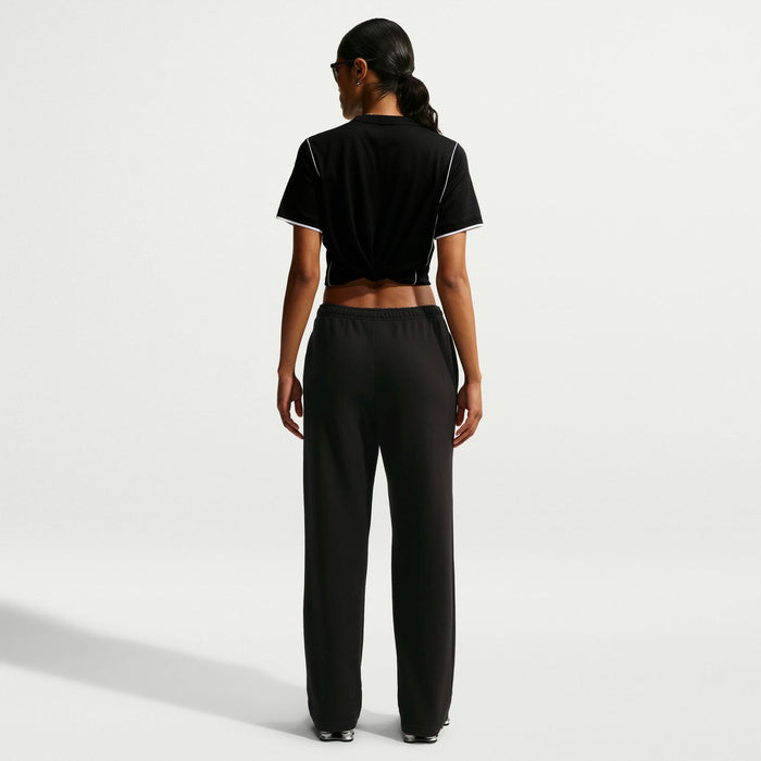 Women's black fleece pants, relaxed fit with elastic waistband, back view