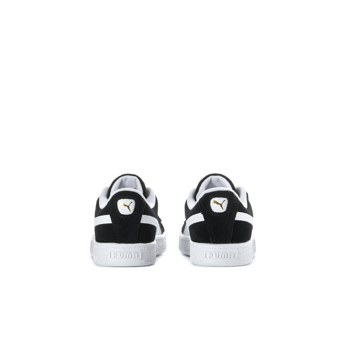 Kids black suede sneakers with white heel stripe and PUMA cat on back.
