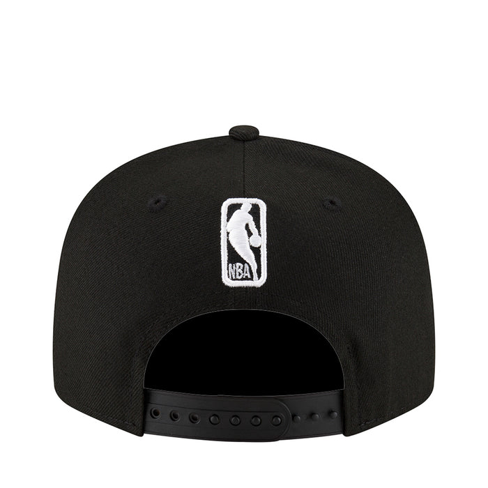 Black baseball cap with white vertical icon logo