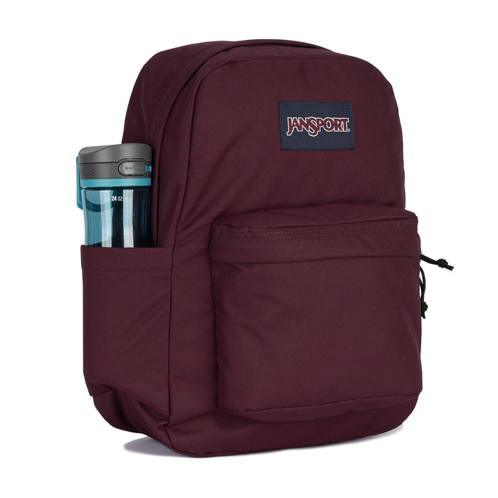 Maroon Jansport backpack with front pocket, side bottle holder, and logo patch
