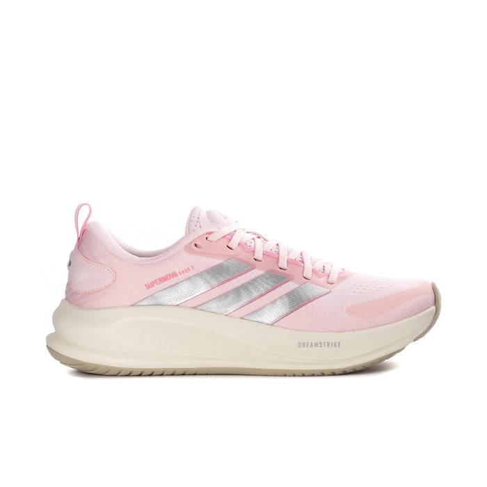 Women's pink athletic sneaker with silver stripes and light cream sole