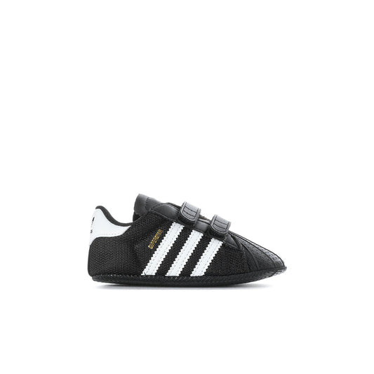 Infant black adidas Superstar sneaker with white three stripes and Velcro strap