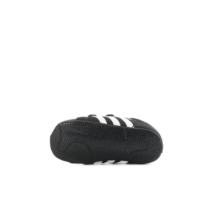 Infant black adidas Superstar sneaker sole with textured tread and three stripe detail