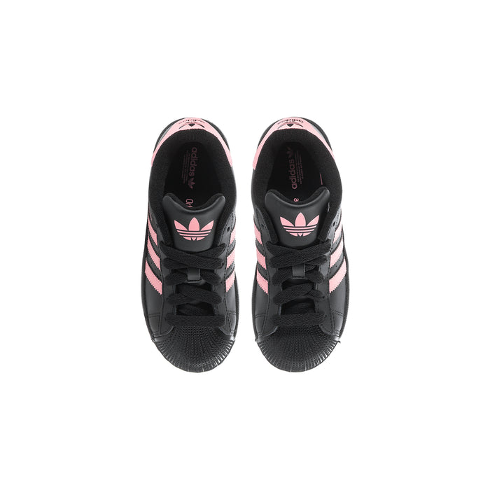 Kids' adidas sneakers, black interior view with pink-striped toe and laces