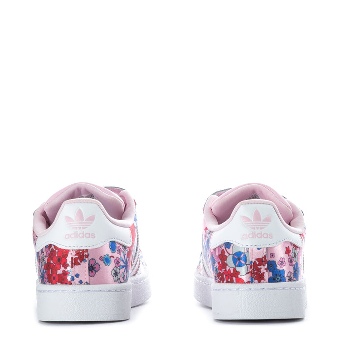 Kids' sneakers back view with pink heel tabs, floral upper, and white midsole