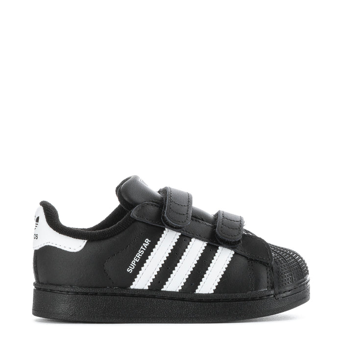 Toddler black sneakers with white triple stripes and Velcro strap