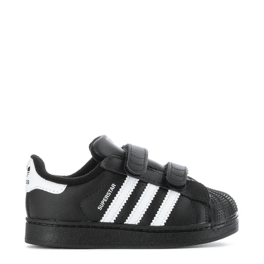 Toddler black sneakers with white triple stripes and Velcro strap