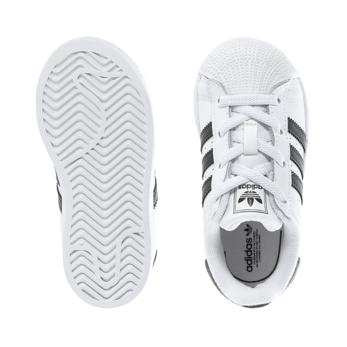 Toddler sneaker outsole and heel view in white with textured tread