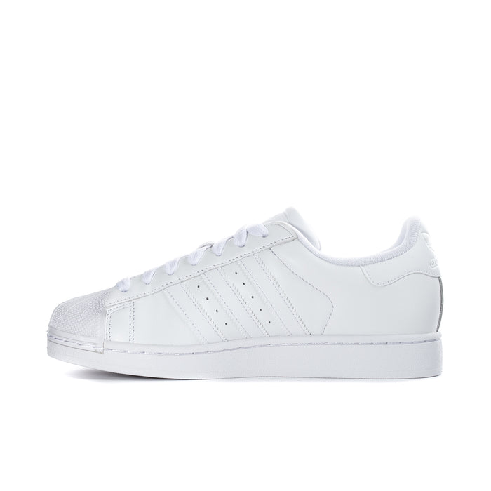 White womens low-top sneakers with three stripes and smooth leather upper