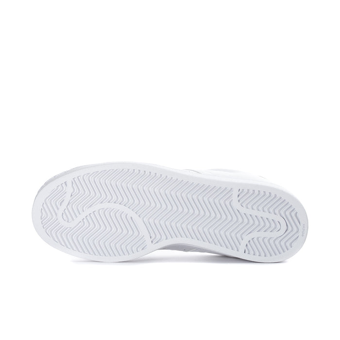 White womens sneaker outsole with textured herringbone tread pattern