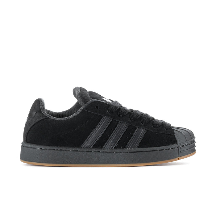 Superstar ST men's sneakers in black with three stripe accents and gum outsole