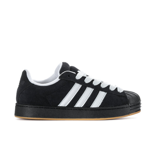 Black and white men's low-top sneakers with three stripe detail and gum sole.