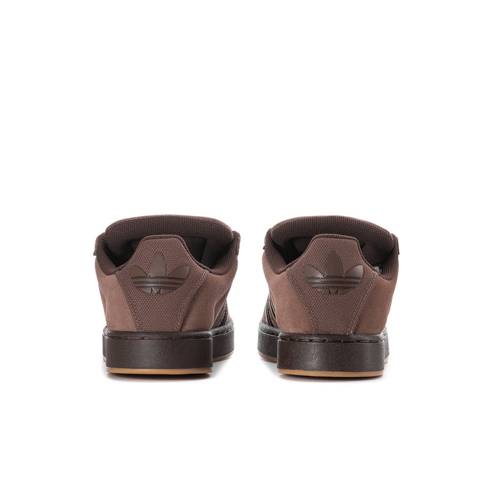 Men's brown suede sneakers, rear view with black heel tab and collar