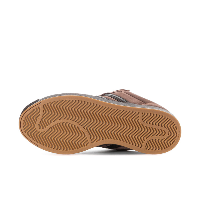 Men's sneaker outsole in brown rubber with herringbone tread pattern