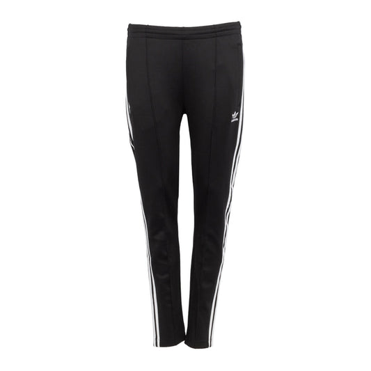 Women's black track pants with white triple side stripes, slim tapered fit