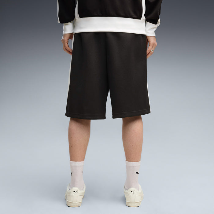 Black baggy men's shorts with straight hem and PUMA logo near right hem