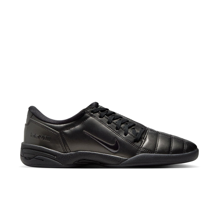 Women's black Nike sneakers with lace-up front and swoosh logo