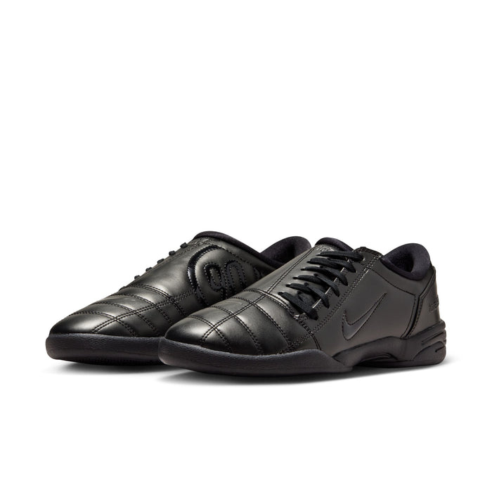 Women's black Nike sneakers, side angle with lace-up and quilted overlays