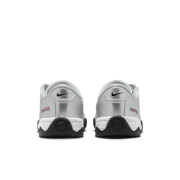 Metallic silver lace-up sneakers with black heel tab and small red tongue detail.