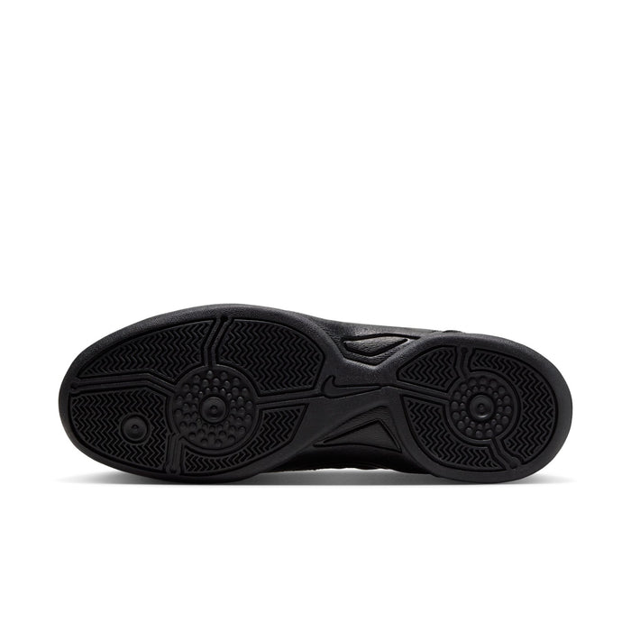 Women's black sneaker outsole with textured traction tread pattern