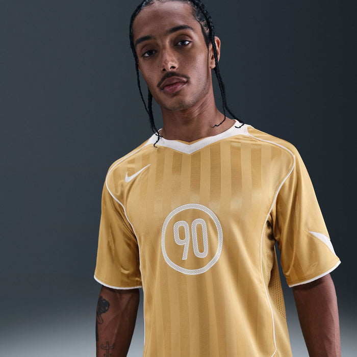 Khaki men's jersey with white collar, Nike logo, and '90' circular chest print