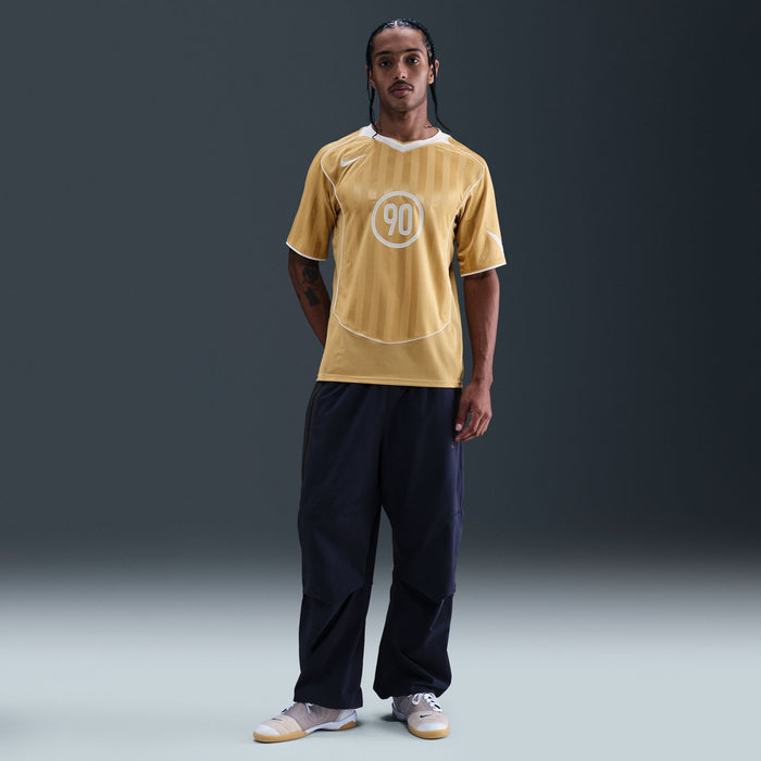Khaki men's athletic jersey with white trim, short sleeves, and '90' front badge