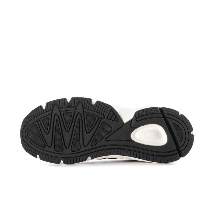 Technochaos women's sneakers, outsole view, black rubber tread with white base